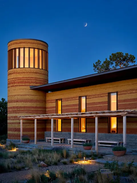 Rammed Earth Village Library at Dusk (Reading Garden View) — ChatGPT Prompt